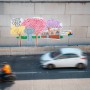 Pintura de ipês no túnel da Avenida Maria Quitéria marca chegada da primavera em Feira de Santana